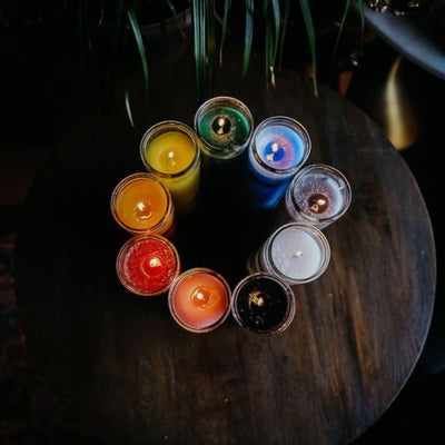 circle of all 7 day candles in various colors